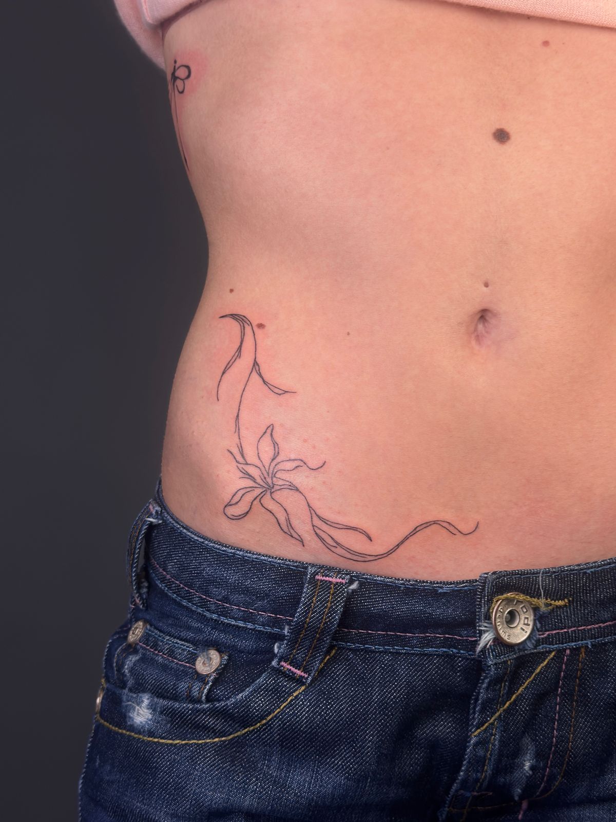 Fine Line Floral Tattoo